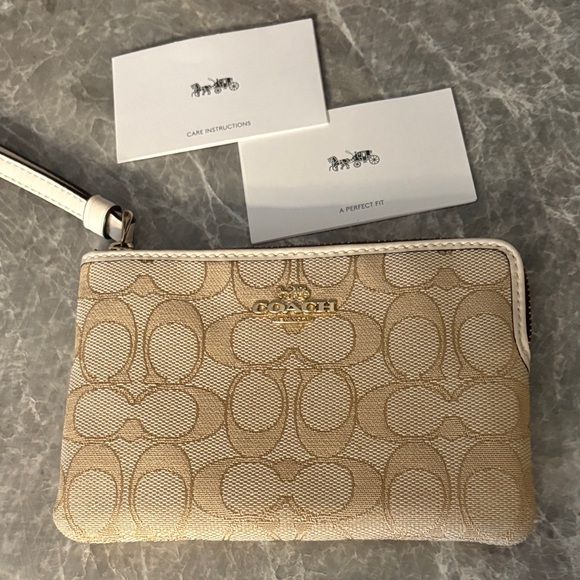 Coach Signature Beige Wristlet - Picture 1 of 2